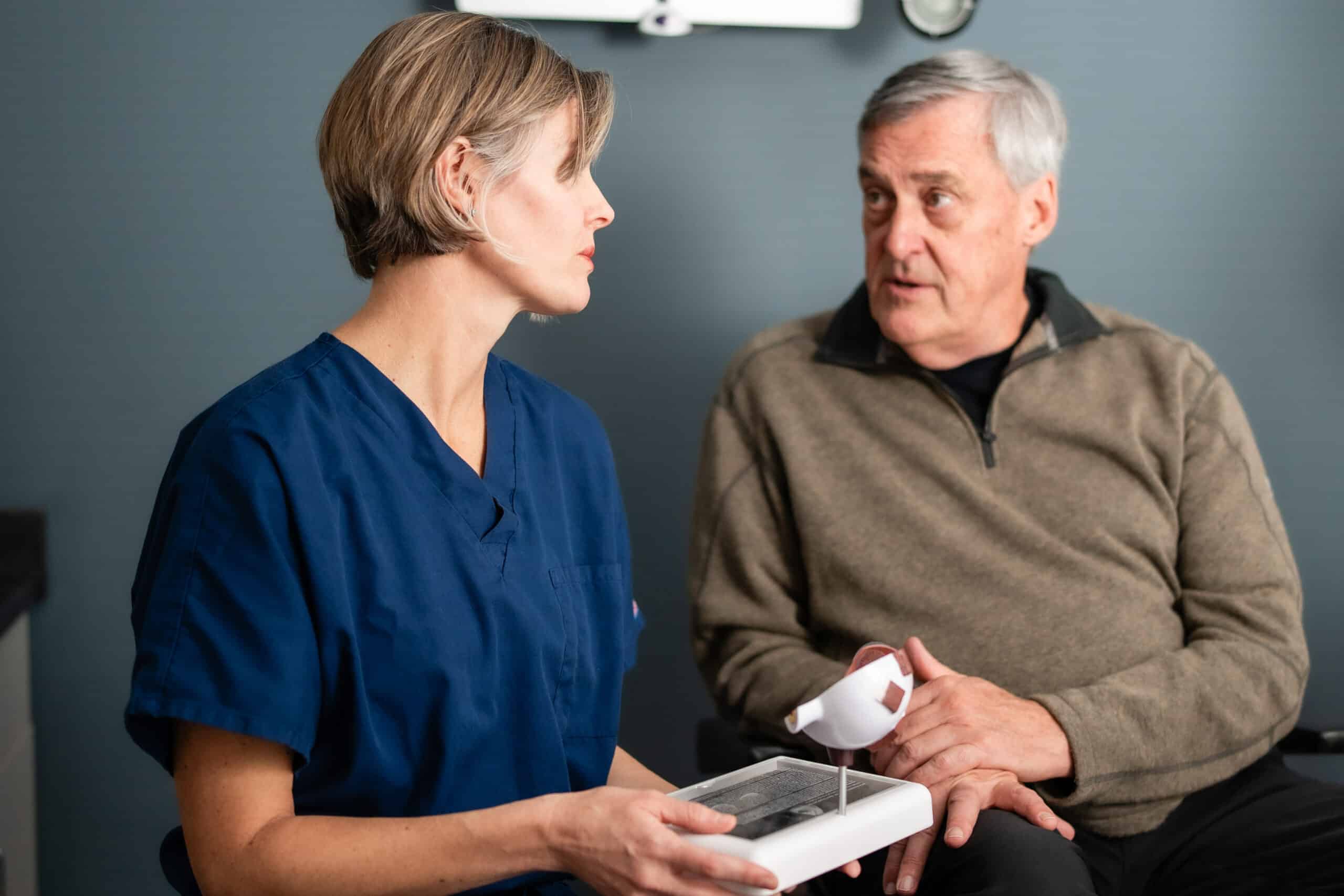 North Idaho Eye Institute eye doctor working with a patient in Coeur d’Alene